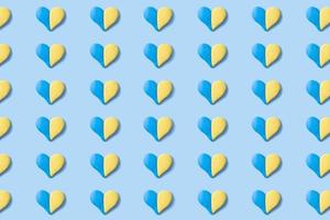 Pattern with many hearts in yellow-blue colors of the Ukrainian flag. Abstract Ukrainian background photo