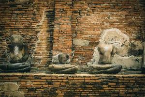 THAILAND Ruins and Antiques at the Ayutthaya Historical Park Tourists from around the world Buddha decay photo