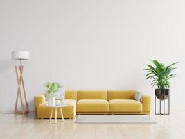 Empty living room with yellow sofa, plants and table on empty white wall background.
