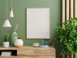 marco de fotos simulado pared verde montado en el gabinete de madera.