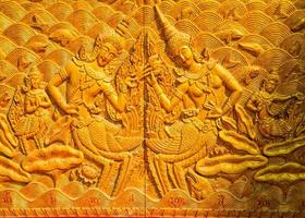 wall sculptures in a church in northern Thailand photo