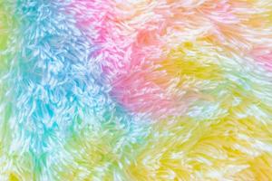 Beautiful multicolored carpets with a fur texture. photo