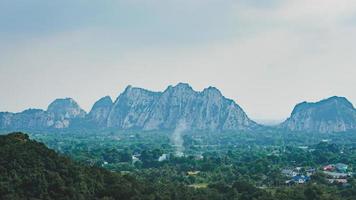 stone mountain surrounded by trees photo