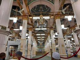 Madinah, Saudi Arabia, Dec 2021 - Visitors from all over the world are busy remembering Allah in different parts of Prophets Mosque Madinah. photo