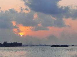 Beautiful Sunset at Male Beach, Maldives photo