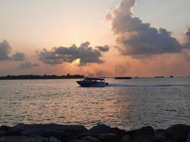Beautiful Sunset at Male Beach, Maldives photo
