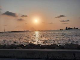 Beautiful Sunset at Male Beach, Maldives photo