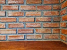 orange square shelf brick block on cement wall textured and background. strong interiors house building. photo