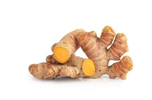 Turmeric Curcuma longa Linn rhizome root sliced isolated on white background with Clipping Path. photo