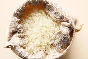 Rice in a bag on table top view photo