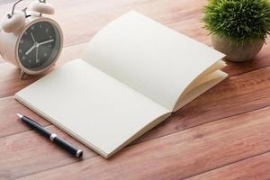 high angle view of open notepad on black background photo
