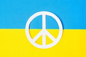 Support for Ukraine in the war with Russia, symbol of peace with flag of Ukraine. Pray, No war, stop war, stand with Ukraine and Nuclear Disarmament photo