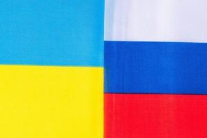 Ukraine. and Russia flags. Pray, No war, stop war, conflict and relationship concept photo