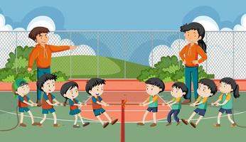 Children playing tug of war game vector