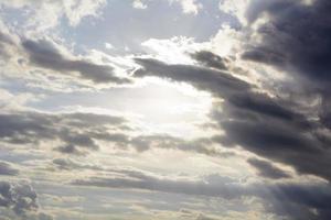 Sun Beam in Dark Clouds and Sky photo