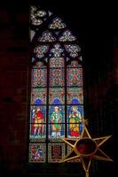 Prague, Czech Republic, 2014. Stained glass window in St Vitus Cathedral in Prague photo