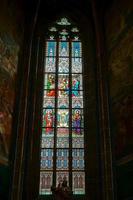 Prague, Czech Republic, 2014. Stained glass window in St Vitus Cathedral in Prague photo