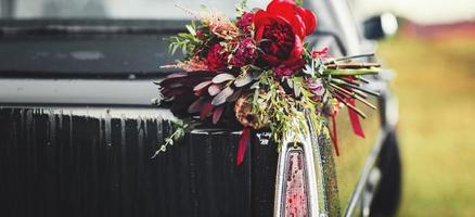 Wedding bouquet in car photo
