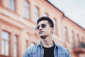 Handsome man with sunglasses photo