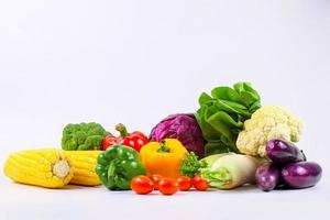 Assorted fresh organic vegetables isolated on white background. photo