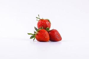 Fresh red strawberries isolated on white background photo