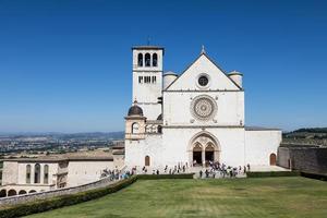 Assisi village in Umbria region, Italy. The most important Italian Basilica dedicated to St. Francis - San Francesco. photo