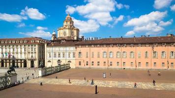 Perspective on the elegant Saint Lawrence church in Turin with a blue sky photo