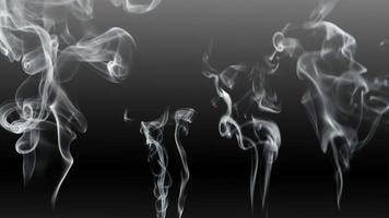 Abstract blurred motion of cigarette smoke on black background photo