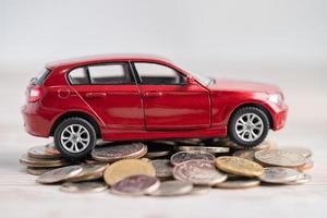 Car on coins background Car loan, Finance,