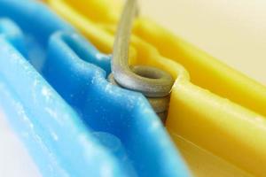 Blue and Yellow Clothespin photo