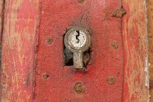 Details of an Old Orange Wooden Door photo