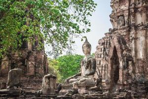 THAILAND Ruins and Antiques at the Ayutthaya Historical Park Tourists from around the world Buddha decay photo