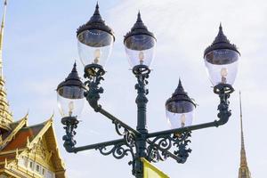 Metal street lamp with blue sky in grand palace, bangkok thailand photo