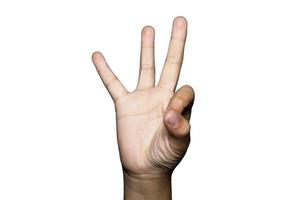 Boy raising tree fingers up on hand on white background. photo