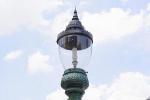 Metal street lamp with blue sky in grand palace, bangkok thailand photo