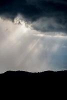 An abstract view of mountains with the ray light. photo