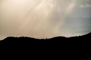 The abstract view of mountains with the ray light. photo