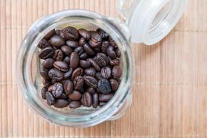 coffee beans in glass jars photo