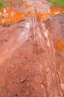 Mud Road after rain in Thailand photo