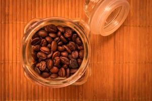 coffee beans in glass jars photo