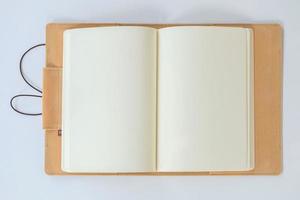 Blank Notebook on a White Paper Background photo