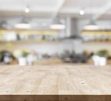 new wood top table layer on blur kitchen background