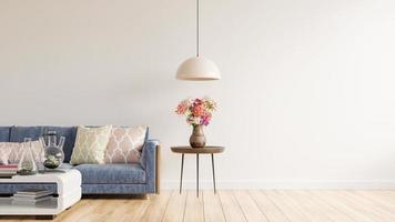 Empty living room have blue color sofa,Ornamental flower vase on table With empty white wall background. photo