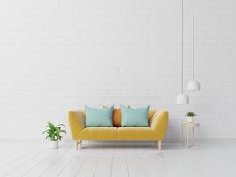 Modern living room interior with sofa and green plants,lamp,table on white wall background. photo