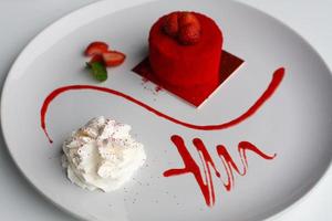 sweet strawberry cake on plate photo