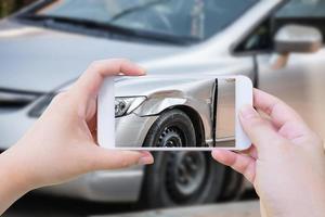 woman using mobile smartphone take photo car crash accident