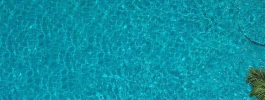 Aerial view images of swimming pool in a sunny day. photo