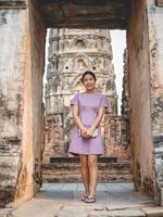 Woman and old temple photo