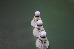 Badminton shuttlecock and racket for badminton sport. photo