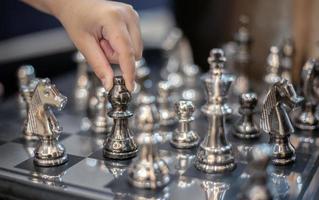 hand move silver hourse model on board strategic game